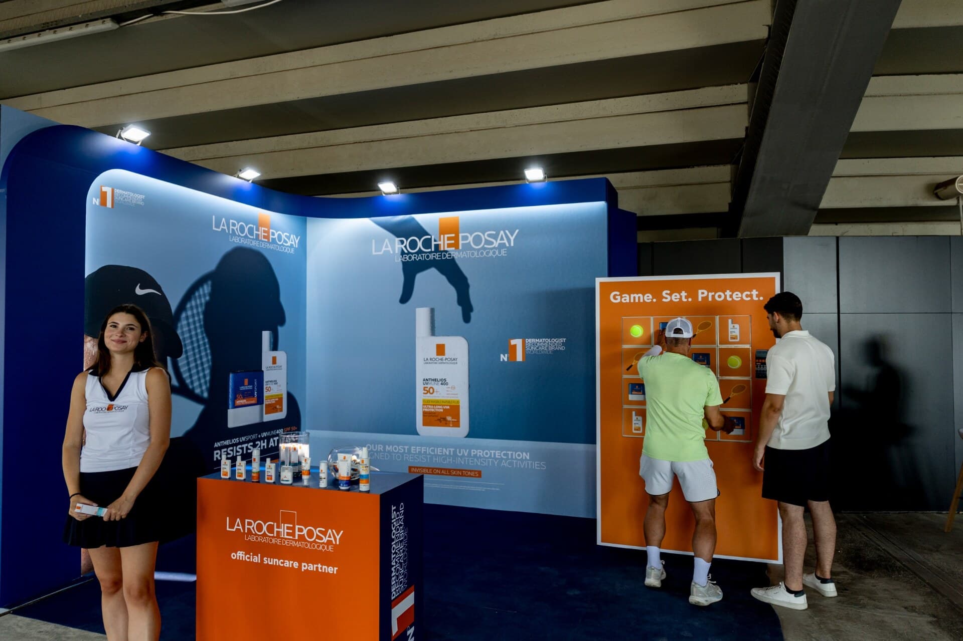 La Roche-Posay Fan Zone activation at the Vanda Pharmaceuticals Athens Open 250, with the Anthelios range on display and the 'Game. Set. Protect.' interactive wall